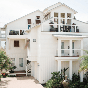 building your dream home featuring exterior of a beautiful white multi-story beach home