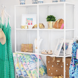 Coastal Closet Merchandise And Décor On Display On Square Shelves
