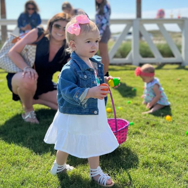 Young Girl Easter Egg Hunting at Palmilla Beach Easter Event