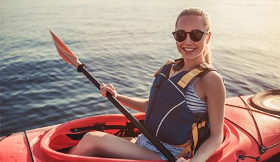 Woman Enjoying Kayaking Near Palmilla Beach