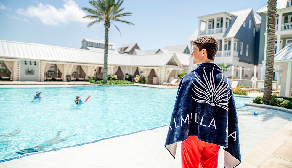 Young Boy Enjoying Pool Amenities at Palmilla Beach